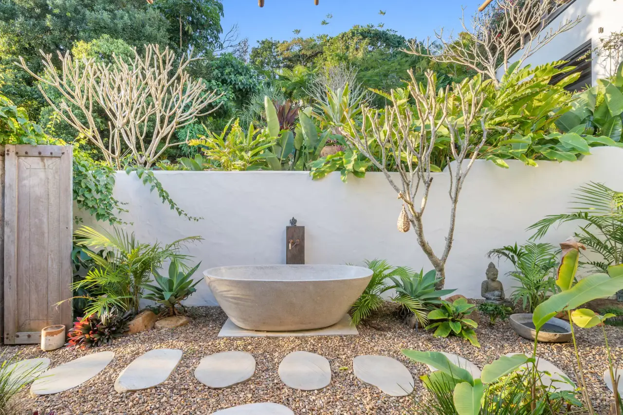 Stone bath in a private walled garden